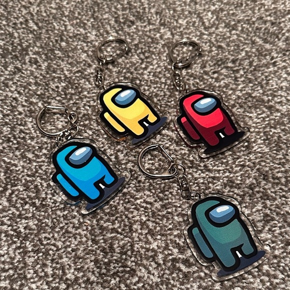 Among Us Game Pack of 4 Acrylic Keychains Cyan Magenta Yellow and Green - Picture 1 of 2